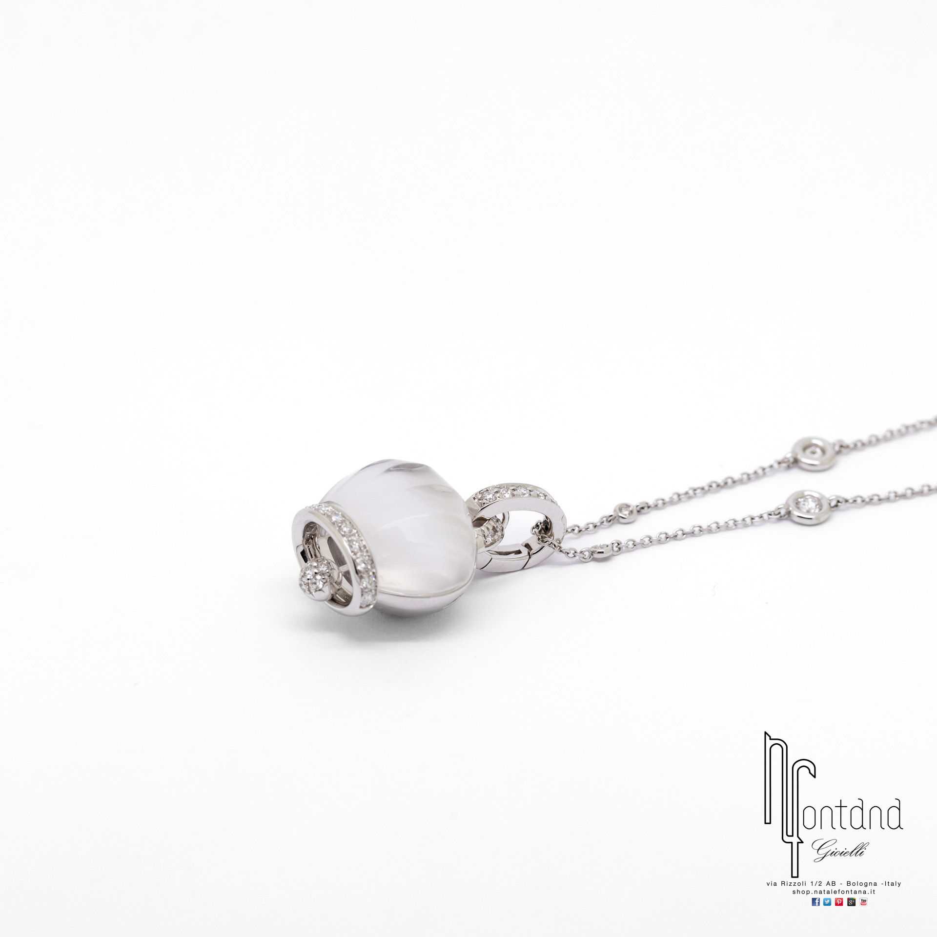 CIONDOLO CAMPANELLE IN ORO BIANCO 18KT, CRISTALLO DI ROCCA E DIAMANTI