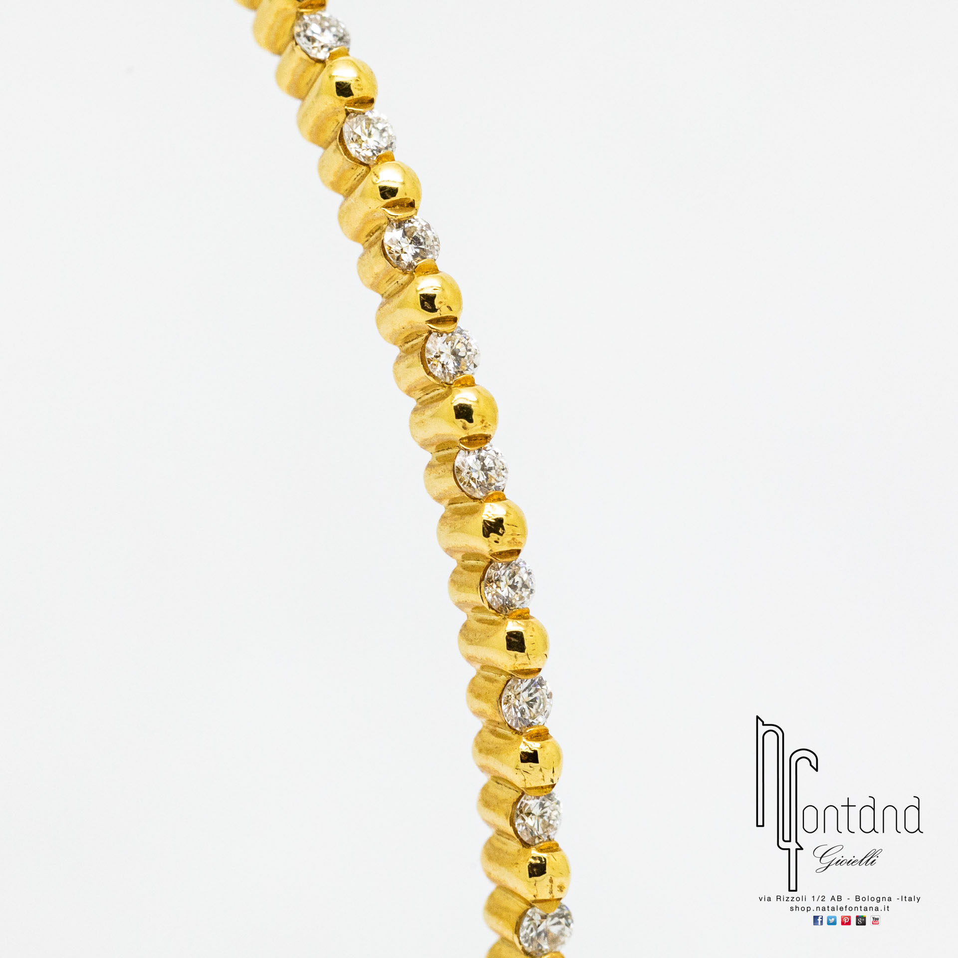 ORECCHINI A CERCHIO ANIMA '70 IN ORO GIALLO 18KT CON DIAMANTI BIANCHI