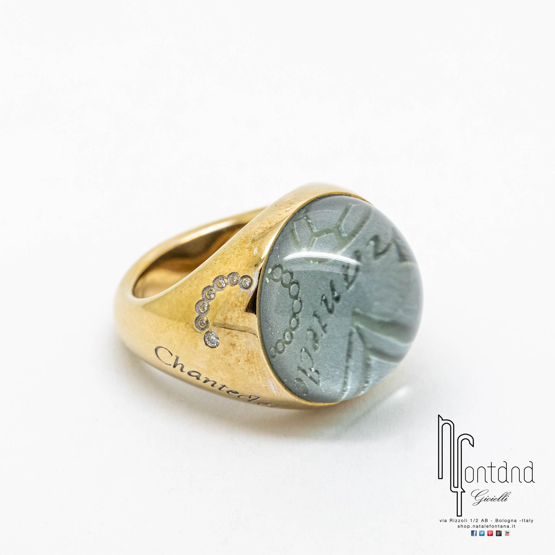 ANELLO SUAMEM IN ORO GIALLO, DIAMANTI, QUARZO BLU, SMERALDI E RUBINI