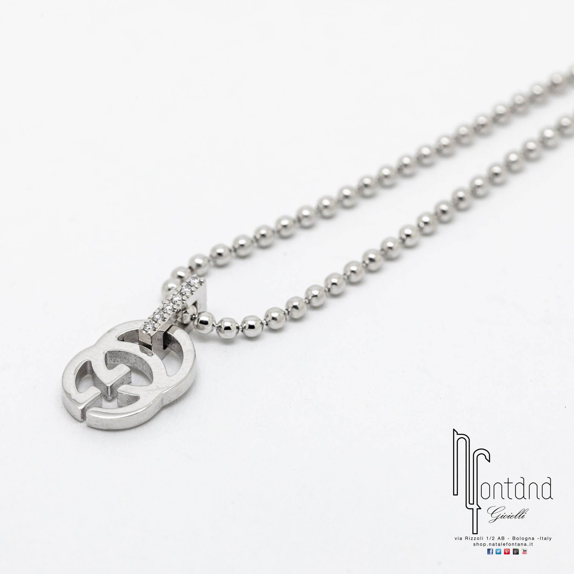 Girocollo RUNNING G in oro bianco 18kt e brillanti