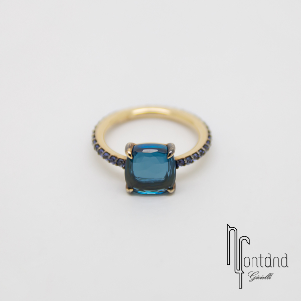 Pomellato - Anello collezione BABY in oro bianco 18kt con topazio e zaffiri